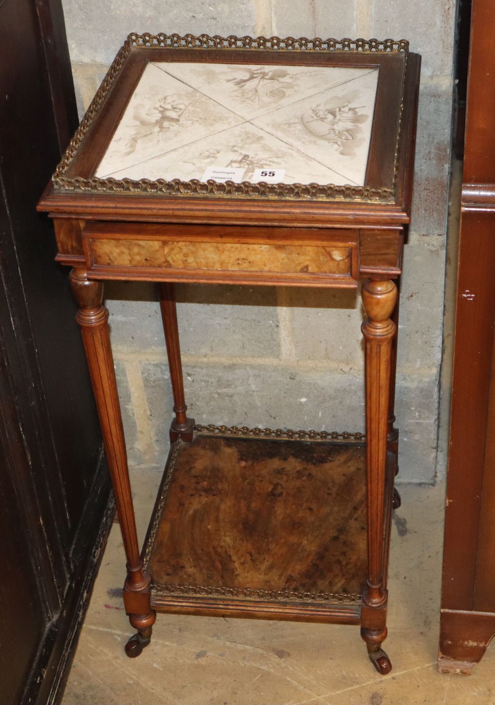 A late 19th century French walnut etagere with tile inset top and frieze drawer, W.37cm